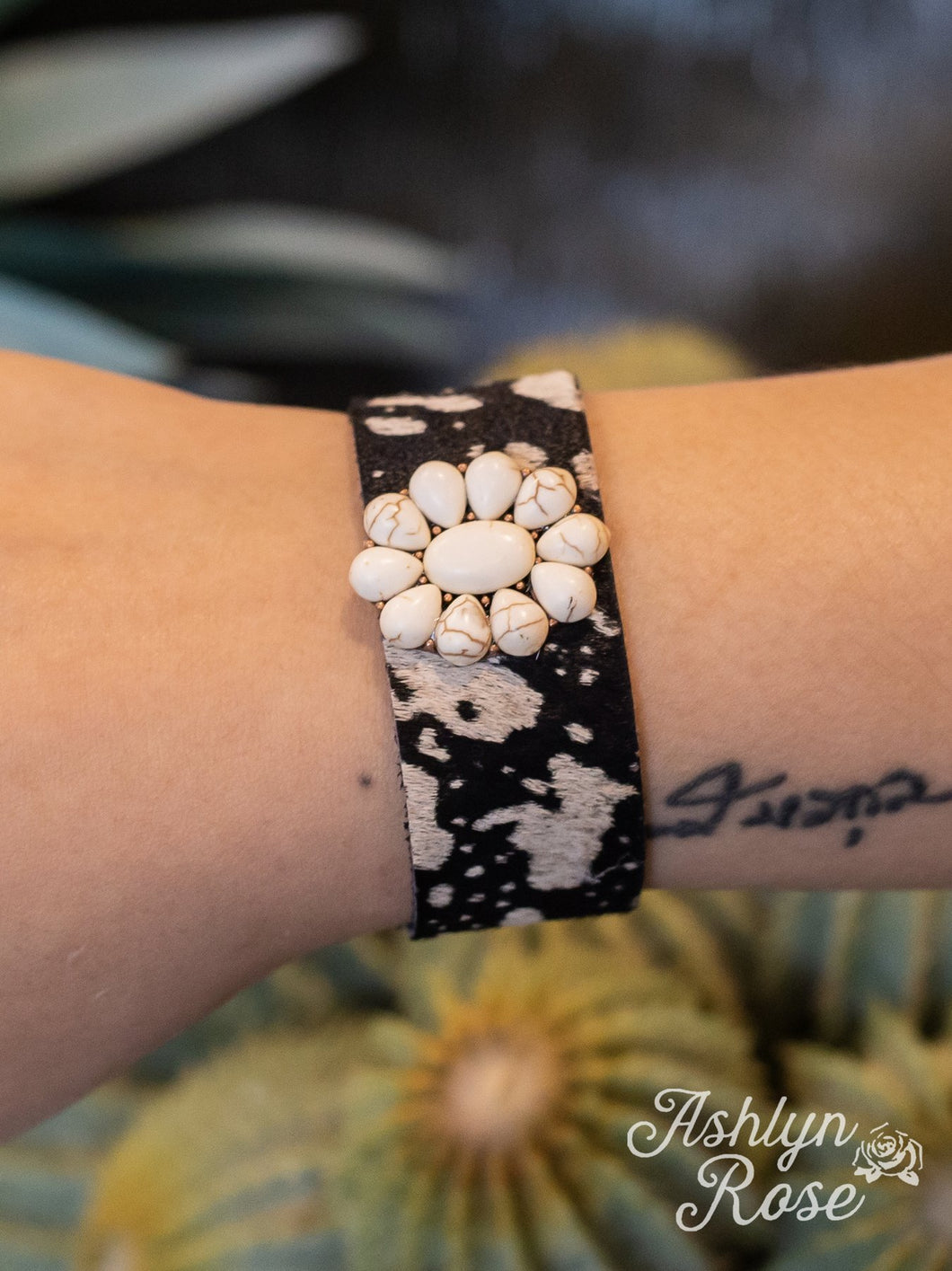 BLACK COW SUEDE CUFF BUTTON BRACELET WITH WHITE FLOWER STONE