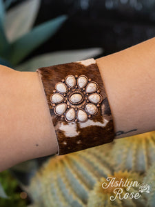 BROWN COW SUEDE CUFF BUTTON BRACELET WITH A WHITE FLOWER STONE